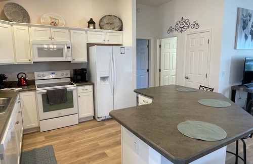 Fruitland Park House | Stylish Home with Golf Cart, Lanai & Prime Location Near Town Squares!
