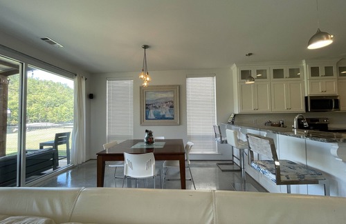 Mid America House | Stylish Lakefront Home - Serene Summer Views and Private Waterfront Access