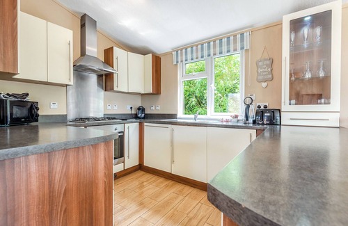 Halfway House Ski Chalet | Stylish luxury lodge with meadow view.