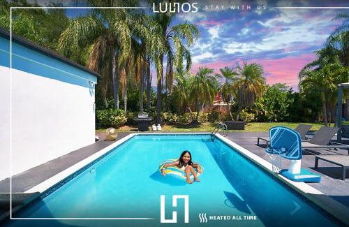 Cutler Bay House | Stylish Retreat Heated Pool Basketball Game Room L41