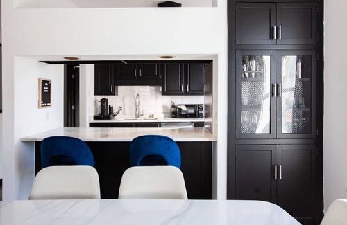 Lowry Hill East Condo | Stylish Two-Bedroom Near Restaurants & Lakes! (Long Stays)