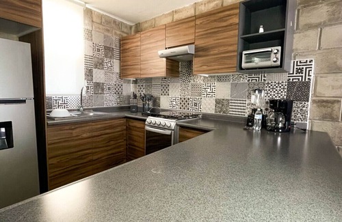 Downtown Guadalajara Apartment | Stylish urban loft with access to gym and work rooms.