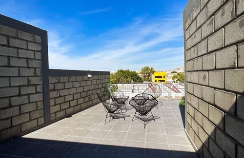 Downtown Guadalajara Apartment | Stylish urban loft with access to gym and work rooms.