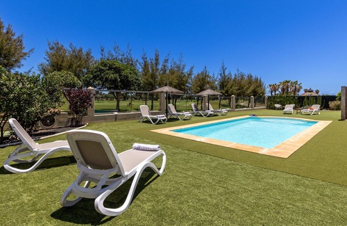 Caleta de Fuste Villa | Substantial Villa for 6 adults with outdoor covered terrace, pool and gardens