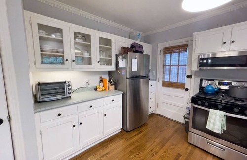 Lindridge-Martin Manor House | Suburb Living in the Heart of the City! 2Br with Forest Sunroom and Office
