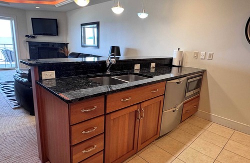 Traverse City Condo | Suite with direct view of Grand Traverse Bay