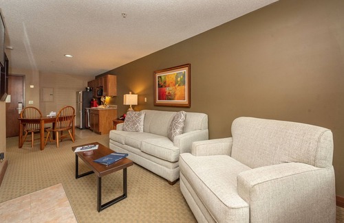 Thayerville Apartment | Suites at Silver Tree A116: 1 bedroom standard view suite with fireplace, kitche
