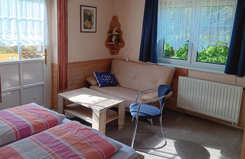 Hermsdorf-Erzgebirge Apartment | Summer freshness and winter fun at Haus Bergfrieden