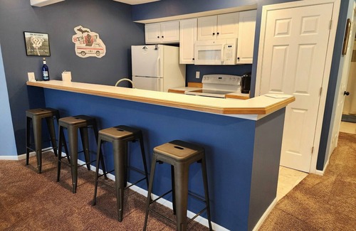 Bellaire Condo | Summer fun Northern Michigan! 2 bedroom, 2 bath. Pool and private beach access