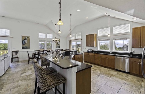 Wind Over Waves House | SUMMER SAVINGS- Soundside Dog Friendly Home w Pool, Hot Tub, Basketball, Theater