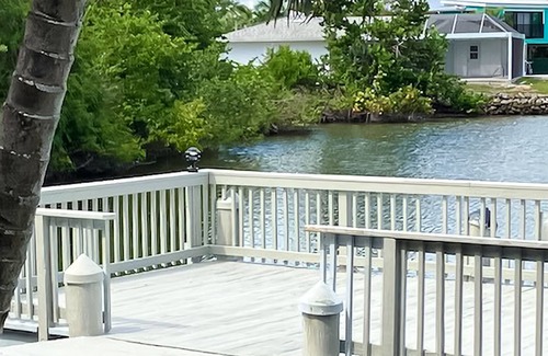Isles of Capri Condo | Sun-filled Marco Island studio on the bay with firepit & breathtaking views