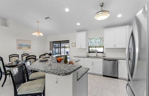 Pelican House | Sun, Fun & Relaxation Await with Heated Pool, Lanai & Spacious Comfort – K La Vie - Roelens