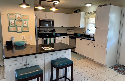 The Villages House | Sunlit retreat overlooking championship fairways—your Florida oasis awaits!