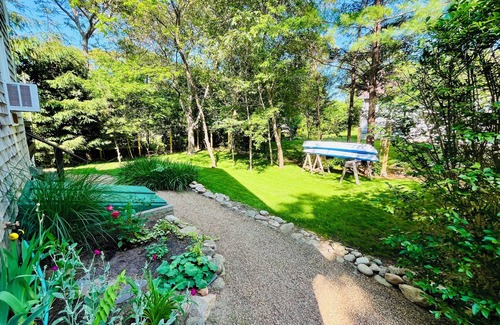 Lagoon Heights House | Sunny 3 bedroom cape with large deck, porch and kayaks. Pet friendly.