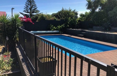 Raumati Beach House | Sunny Architectural Designers home - two levels