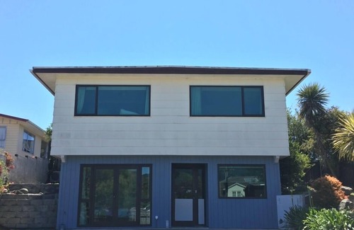 Raumati Beach House | Sunny Architectural Designers home - two levels