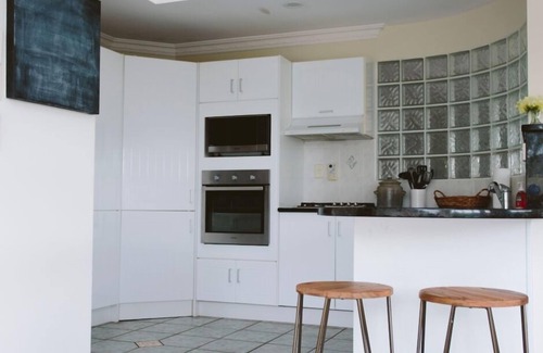 Oakura House | Sunny beach house, walking distance to surf
