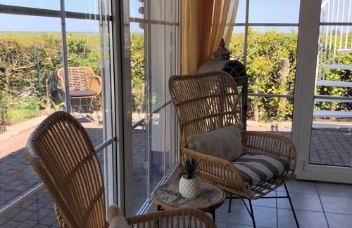 Vorpommern-Greifswald District House | Sunny beach house right on the lagoon with water views for 2-4 people