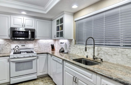 San Clemente Condo | Sunny condo with loft and spacious patio surrounded by palm trees