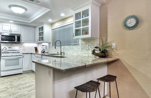 San Clemente Condo | Sunny condo with loft and spacious patio surrounded by palm trees
