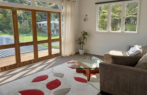 Huia House | Sunny house in sheltered bay, great views, classic kiwi ambience