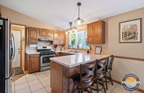 Como House | Sunny Lake Geneva Escape | BBQ Game Room Private Beach Access