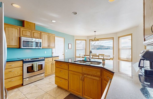 Chelan House | Sunny, lakefront home with huge patio, floating dock & 2 buoys