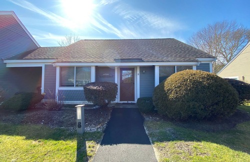 Brewster Condo | Sunny, single level Susanna Village patio home with golf course views and pool access.