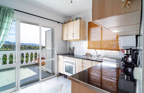 Oasis del Capistrano Apartment | Sunny Terrace Chimenea by Casasol