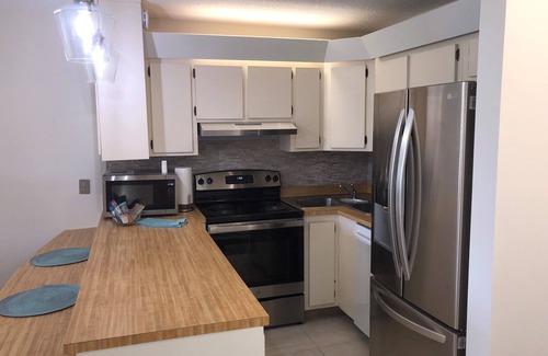 Fort Pierce Condo | Sunrise & Golf Course View. Near Beach, Golf, Community Center, & All Amenities.