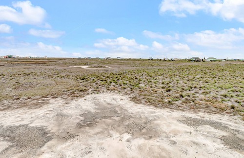 Rockport House | Sunset-view getaway with a wrap-around balcony, firepit, central AC, & W/D