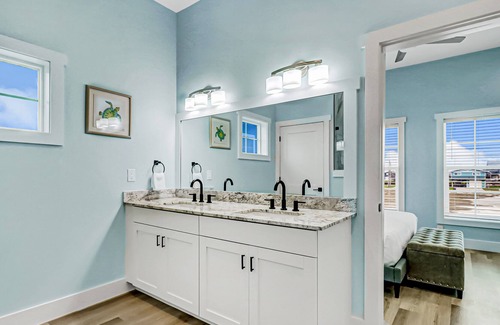 Rockport House | Sunset-view getaway with a wrap-around balcony, firepit, central AC, & W/D