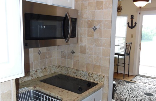 North Shore Condo | SUNSET VIEWS-Pristine WATERFRONT Penthouse Condo on SML- Boat Slip Available