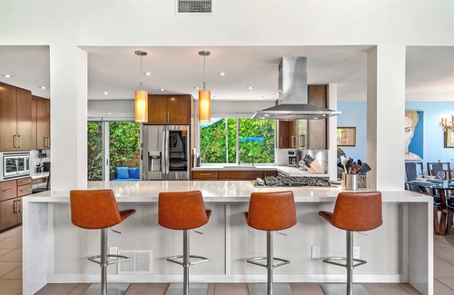 Deepwell Estates House | Suntan Palms - Bold Design, Poolside Fun, Spa, Fire Pit & Views