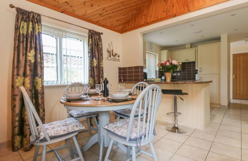 Sticker House | SUNTRAP HIDEAWAY, pet friendly, with open fire in St. Austell