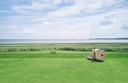 Wangerland House | Sustainable & climate-neutral accommodation in the Green Tiny House Pioneer with sea view