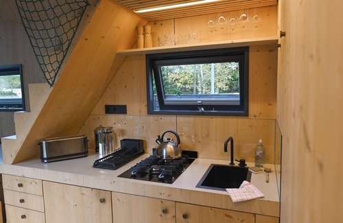 Schortens House | Sustainable Tiny House Pioneer by the natural bathing lake in Friesland