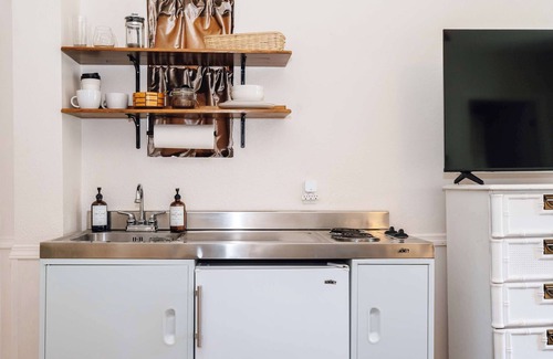 Historic Railroad District House | Swank Boutique Suites | King with Soaking Tub