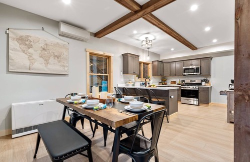 Bryant Pond Cabin | Sweeping mountain and water views from a top a mountain side
