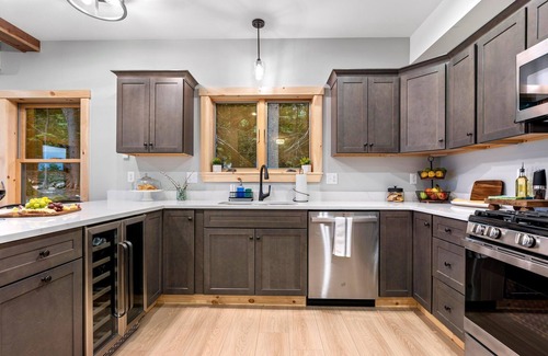 Bryant Pond Cabin | Sweeping mountain and water views from a top a mountain side