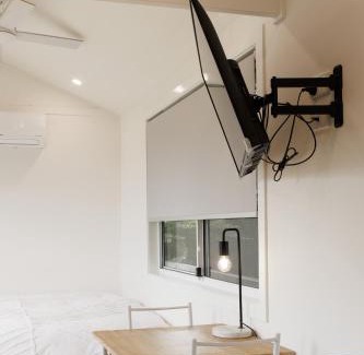 Wollongong Ski Chalet | Sweet beautiful TINY HOME with pool and 2 minute drive to the beach