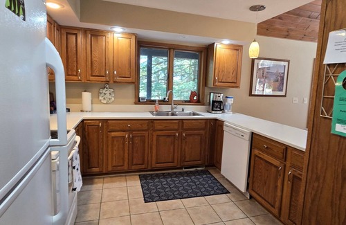 Swanton House | Tall Pines- 5-bedroom with hot tub and dock slip!