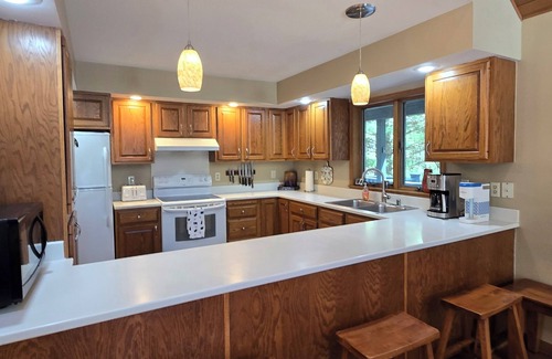 Swanton House | Tall Pines- 5-bedroom with hot tub and dock slip!