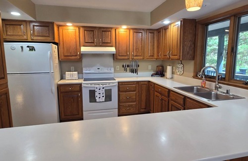 Swanton House | Tall Pines- 5-bedroom with hot tub and dock slip!