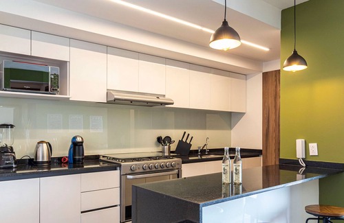 Hipodromo Condesa Apartment | Taman by Kukun Summar