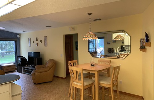 Riverview House | Tampa area home with solar-heated pool, hot tub, river and large dock.
