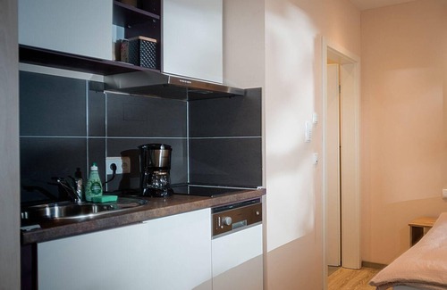 Marktheidenfeld Apartment | TENNENBODEN – Komfort-DZ, die ehemalige Tenne in der Hofstallung