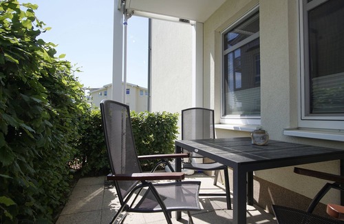 Gohren Apartment | Terrace, free use of the AHOI adventure pool and sauna - Sea view apartment 43