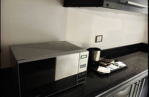 Nasr City Apartment | Terrific 2-bedroom apartment in New Cairo City with WiFi,AC & pvt patio garden