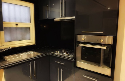 Nasr City Apartment | Terrific 2-bedroom apartment in New Cairo City with WiFi,AC & pvt patio garden